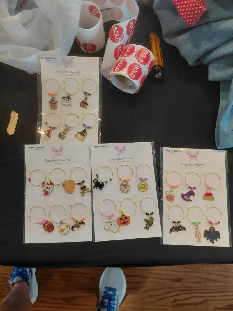 Four sets of Halloween wine glass charms by Pretty Little Paper Co