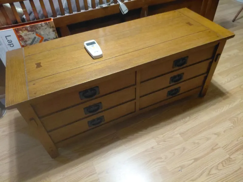 Mission style oak coffee table with six drawers and butterfly inlays